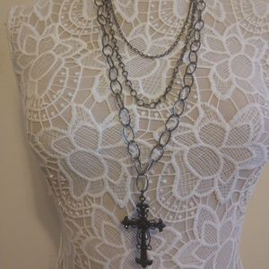 Black shiny stone cross